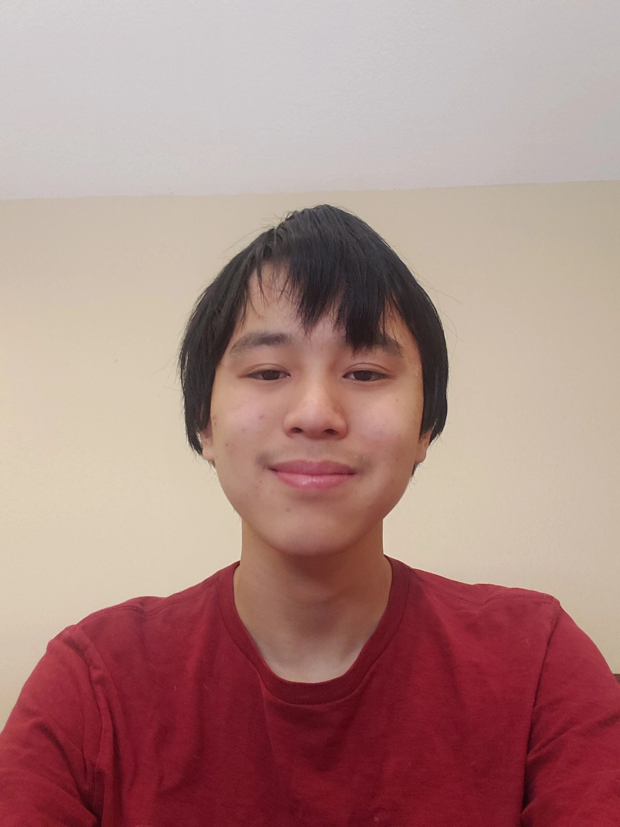 Aiden smiling slightly.