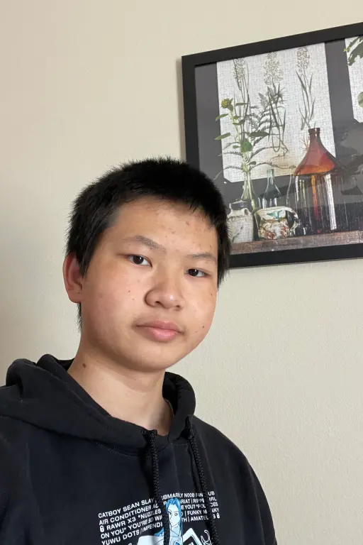 Evan with a painting.